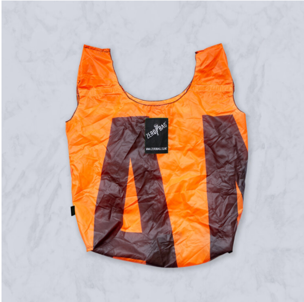 ZEROBAG - clockwork orange with black stripes. Upcycled, super strong versatile Bag. Made in New Zealand. Look how big and strong it is.